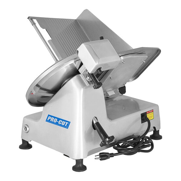 A ProCut KDS-12 meat slicer with a circular metal blade.