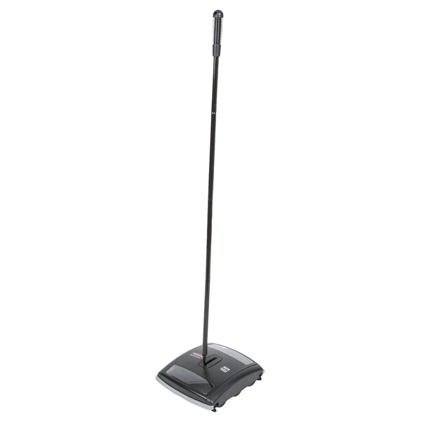 A black Rubbermaid Executive Series floor sweeper with a long handle.