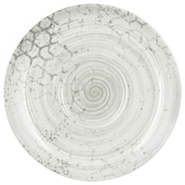 A white saucer with a swirl pattern.