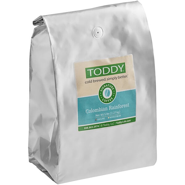 A white bag of Toddy Colombian Cold Brew Coarse Ground Coffee with a label.