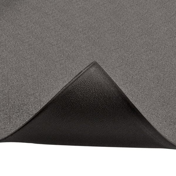A black anti-fatigue mat with a pebble texture.