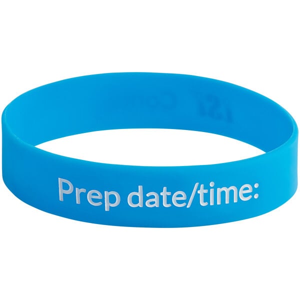 A blue rubber wristband with white text that says "iSi Blue Whipper"