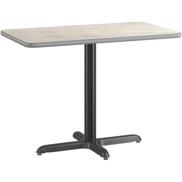 A Lancaster Table & Seating rectangular table with a white and slate grey top on a black base.