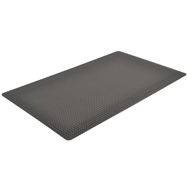 A black rectangular mat with a grid pattern.