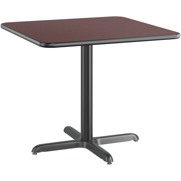 A Lancaster Table & Seating square table with a black base and a cherry top.