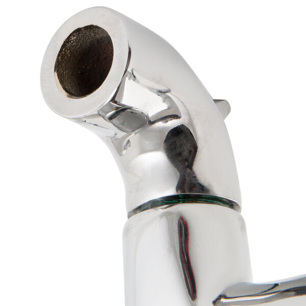 A T&S chrome wall mount mop sink faucet with lever handles.