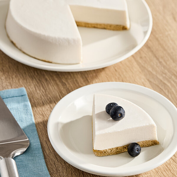 A slice of Daiya vegan cheesecake with blueberries on top on a plate.
