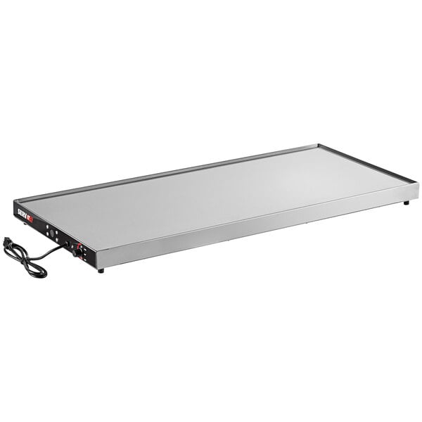 A rectangular stainless steel ServIt heated shelf with a power cord.