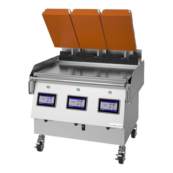A 36-inch Garland Xpress liquid propane clamshell griddle with three orange platens and easyTouch digital controls.