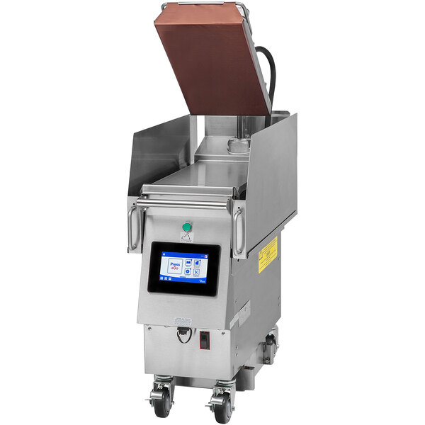 A Garland Xpress natural gas clamshell griddle on a counter.