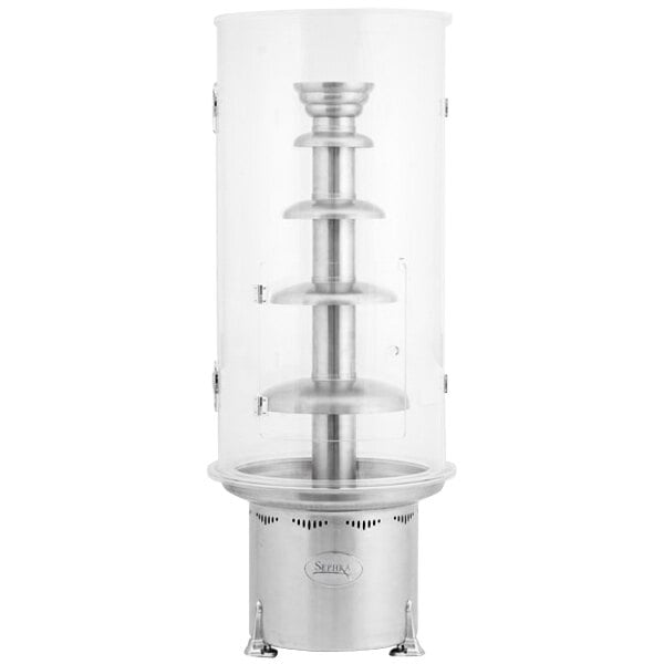 A metal and clear plastic Sneeze / Wind Guard for Sephra Montezuma and Convertible Chocolate Fountains.