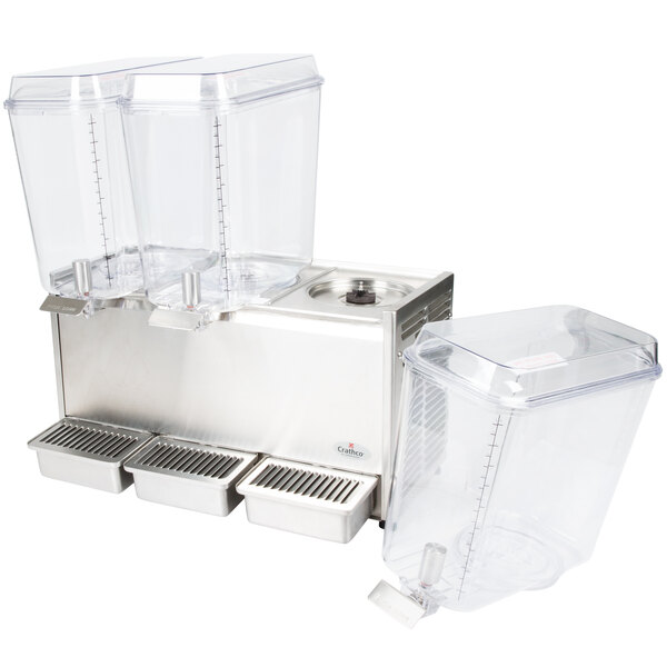 A Crathco stainless steel refrigerated beverage dispenser with three containers.