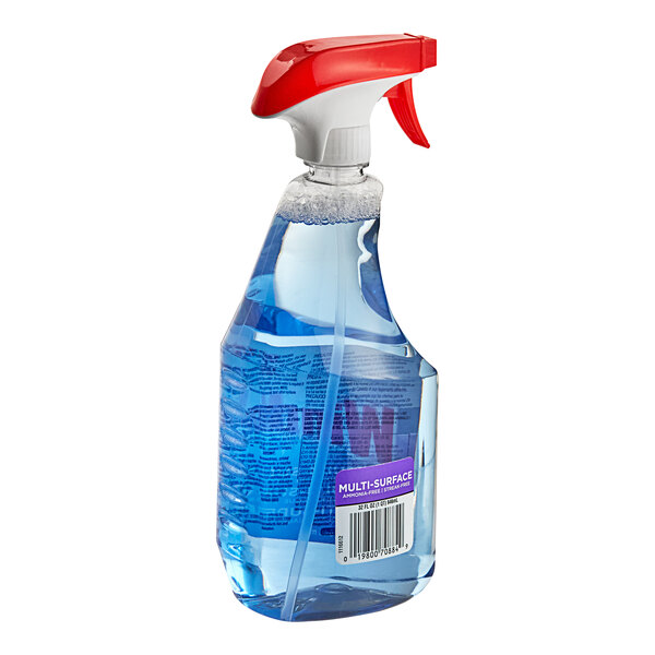 A blue spray bottle of SC Johnson Windex Multi-Surface Cleaner with a red handle.