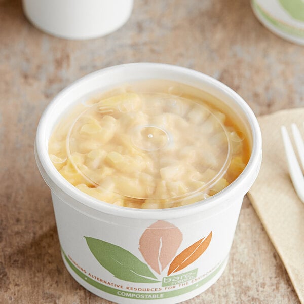 A clear Solo vented lid on a container of food.