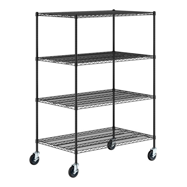 A black metal wire shelving unit with four shelves and four caster wheels.