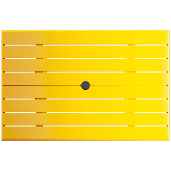 A yellow Lancaster Table & Seating outdoor table with a black circle.