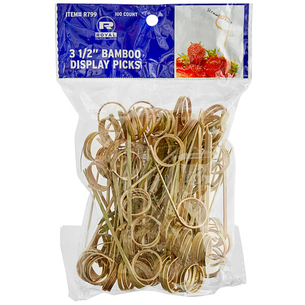 A plastic bag containing a package of Royal Paper bamboo picks.