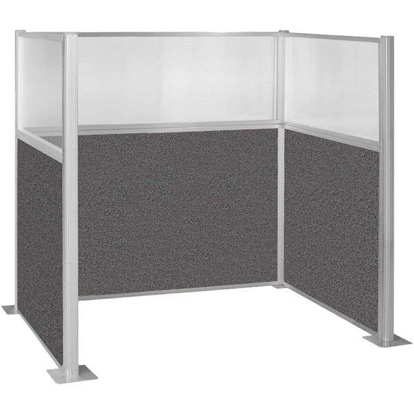 A charcoal gray cubicle with a window.