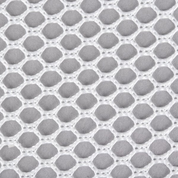A close up of a white mesh Town rice cloth.