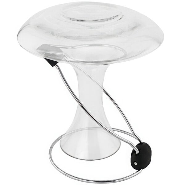 A Franmara metal and glass decanter drying rack with a black handle holding a clear glass decanter.