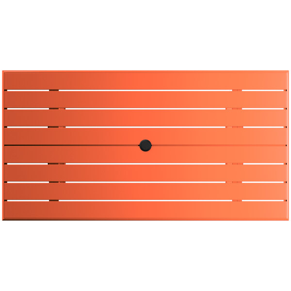 A Lancaster Table & Seating outdoor table with orange slats and a black circle.