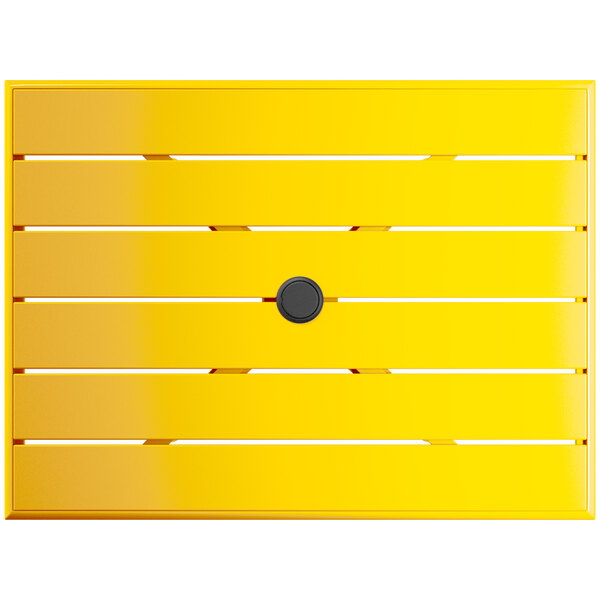 A yellow wooden table with a black circle and a red stripe.