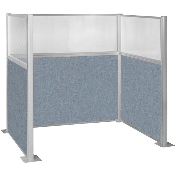 A Versare Hush Panel U-shape cubicle with a blue and white panel and a window.