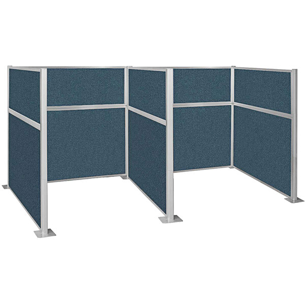 A Versare Hush Panel Caribbean double cubicle with blue fabric panels.