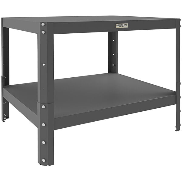 A grey metal Durham Mfg machine table with two black steel shelves.