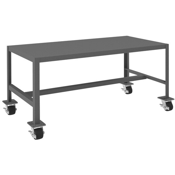 A grey rectangular table with wheels.