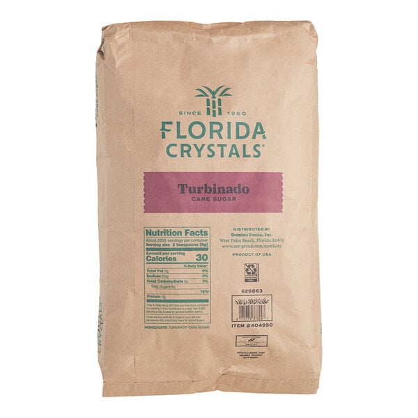 A brown Florida Crystals bag of Turbinado Cane Sugar with green text.