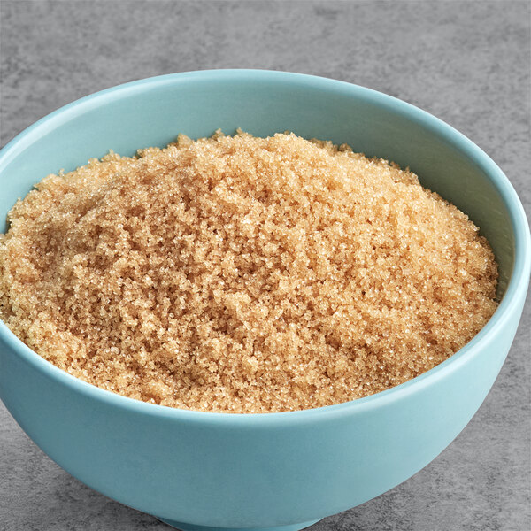 A bowl of Florida Crystals organic light brown cane sugar.