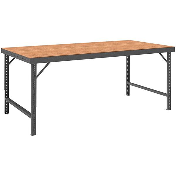 A Durham Manufacturing workbench with a tempered hardboard top and gray metal legs.