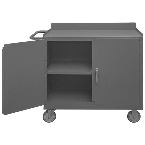 A gray metal cart with a door open.