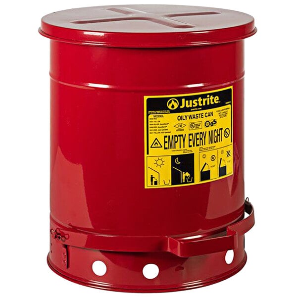 A red Justrite container for oily waste with a yellow label.