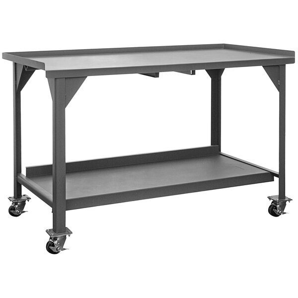 A grey metal work table with wheels.