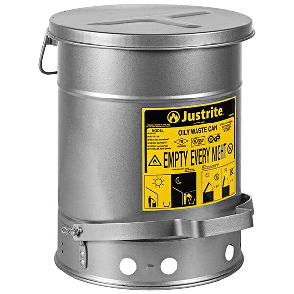 A silver metal Justrite oily waste can with a yellow and black label.