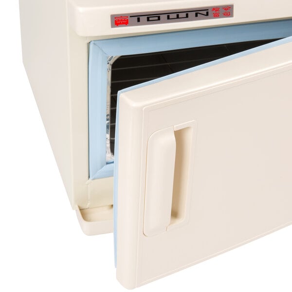 A white Town Oshibori towel steamer with an open door.