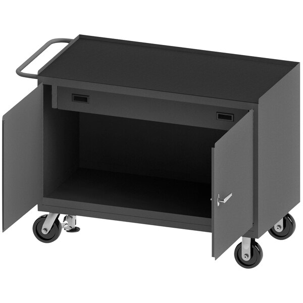 A black mobile workstation cart with open doors and a rubber top.