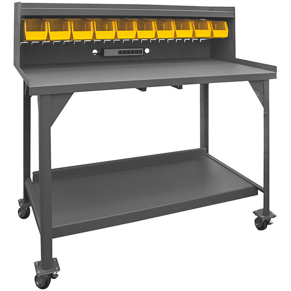A grey Durham Manufacturing heavy-duty workbench with yellow bins on wheels.