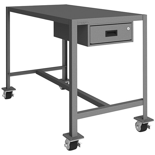 A gray metal Durham machine table with a drawer on wheels.