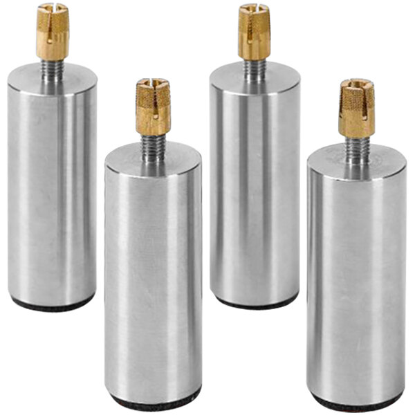 Four silver stainless steel cylinders with brass caps.