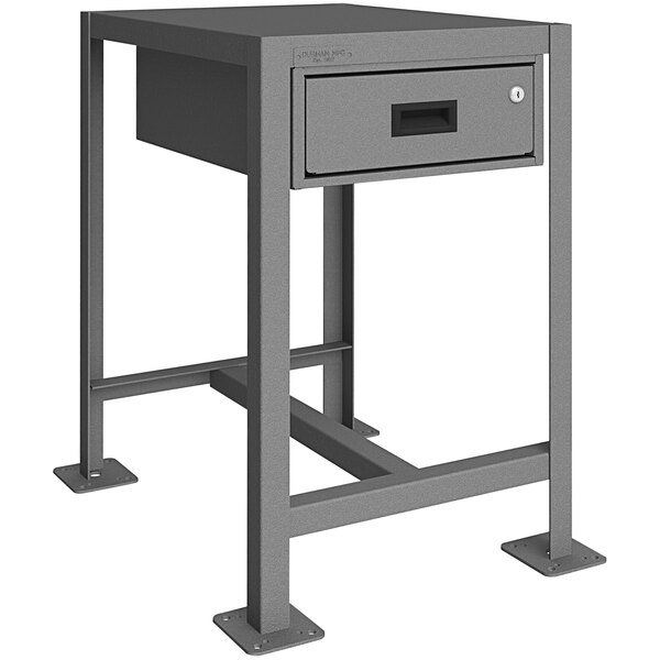 A grey metal Durham machine table with a drawer.