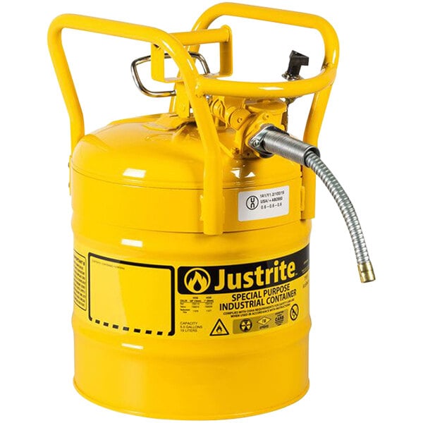 A yellow metal cylinder with a yellow metal hose attached.