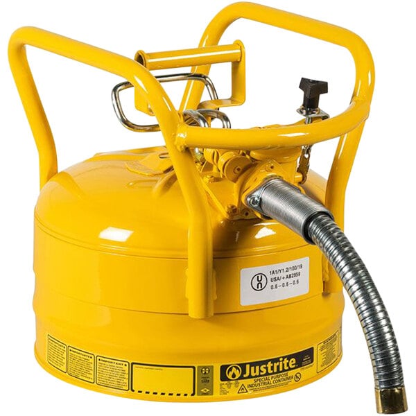 A yellow Justrite safety canister with a metal hose attached to it.