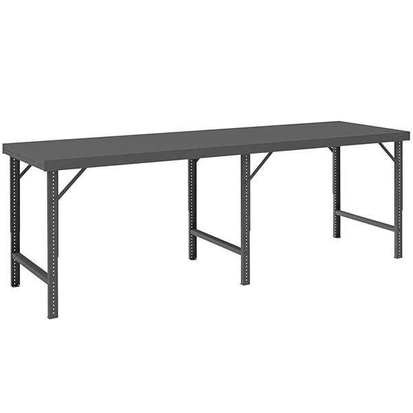 A long rectangular black steel workbench with a gray top.
