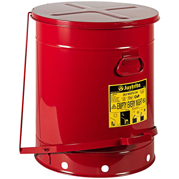 A red metal Justrite oily waste can with a lid and yellow label.