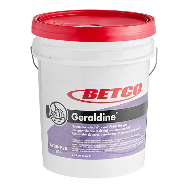 A white 5 gallon Betco bucket with a red lid labeled "Geraldine" on a table.
