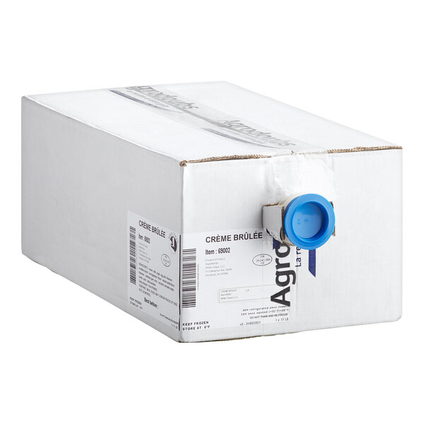 A large white rectangular box with a blue plastic spout on one end and product labels attached to the side.