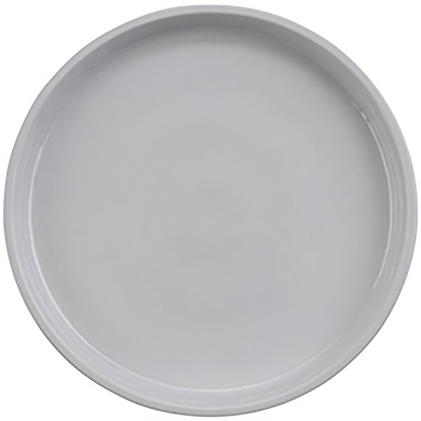 A white GET Roca melamine plate with a rim.